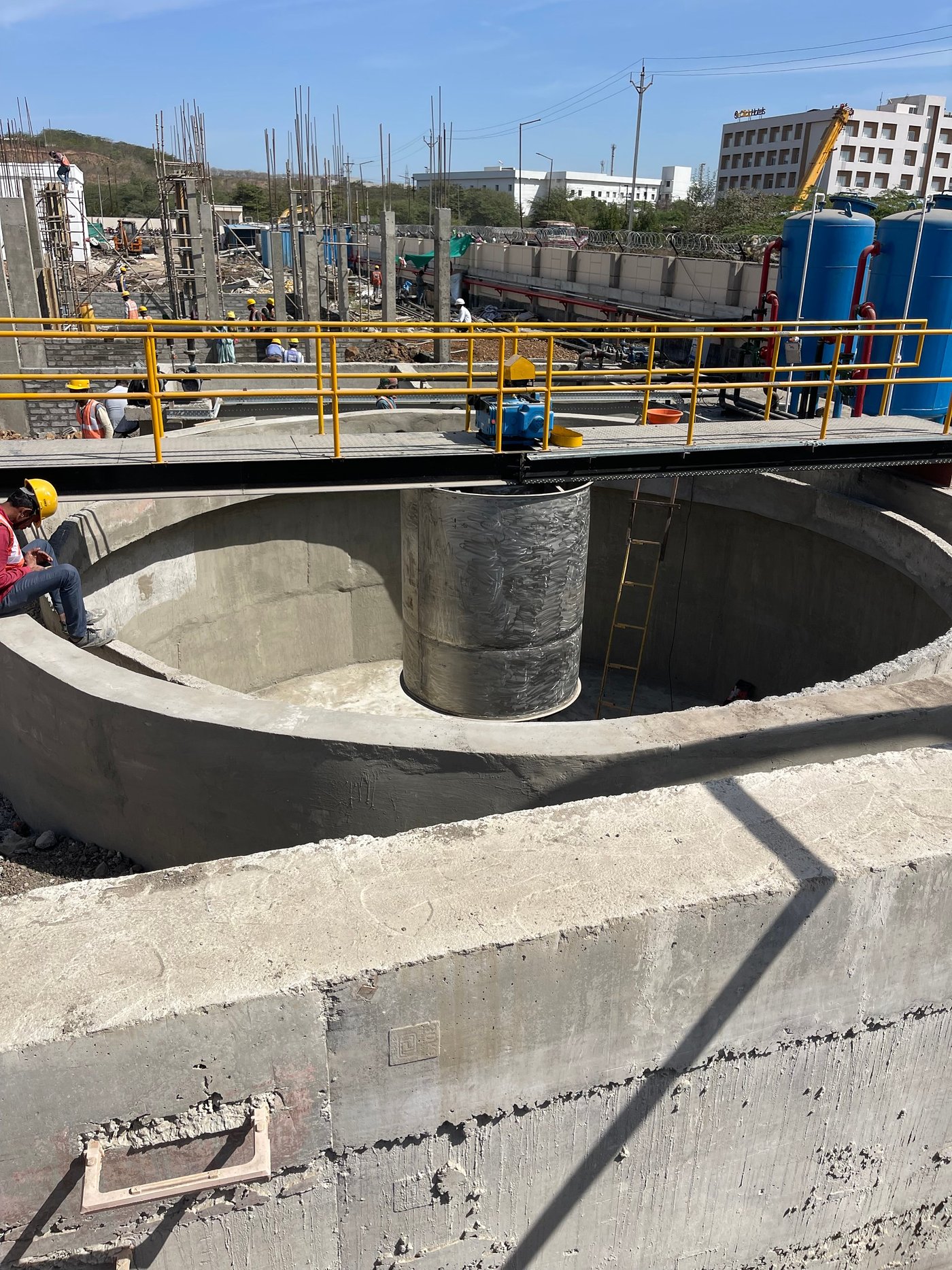 Circular clarifier with drive bridge and stainless steel centre well